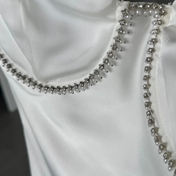 White mini dress with pearls decor details #partydress
Worn once - Picture 2 of 8